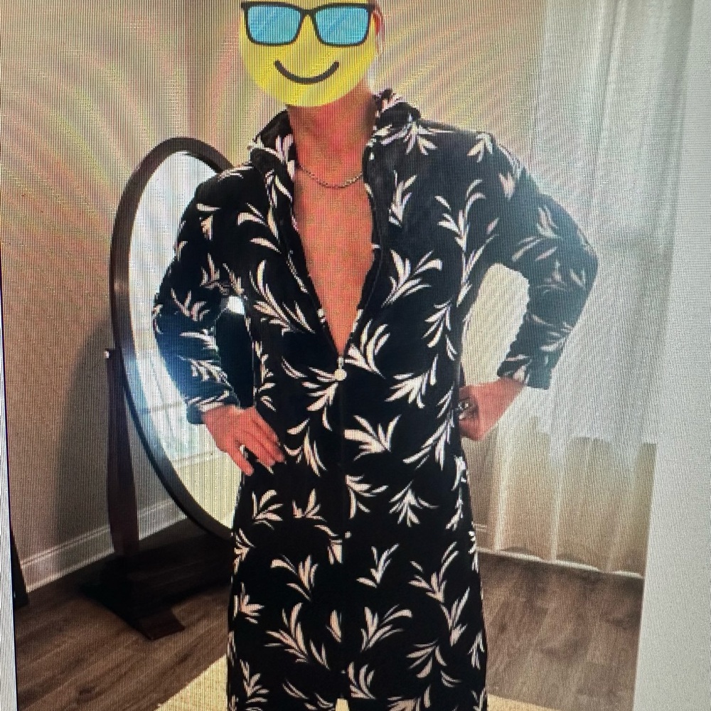 Unisex plush robe. Stretches, zips and has pockets